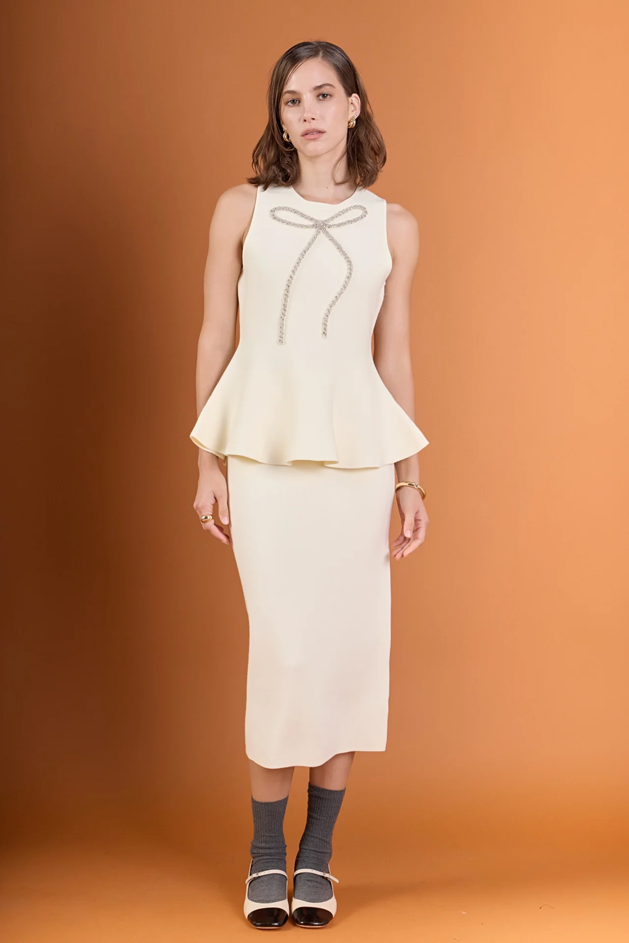 Peplum Bow Embellished Top
